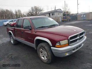 2002 Dodge Dakota SLT with VIN 1B7HL48N62S694380, listed as a IAAI auction lot 42008125 with 152,421 mi miles. Bid and sale history available at carsss.com. Image 1.