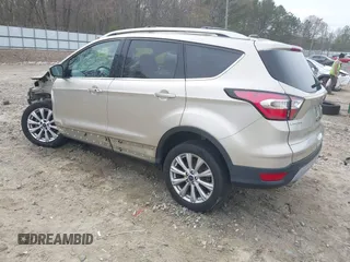 2017 Ford Escape Titanium with VIN 1FMCU0JD2HUC30884, listed as a IAAI auction lot 41801272 with 111,644 mi miles. Bid and sale history available at carsss.com. Image 3.