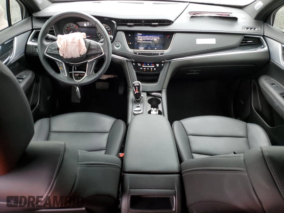 2023 Cadillac XT5 FWD Premium Luxury with VIN 1GYKNCR46PZ159140, listed as a Copart auction lot 45050085 with 28,231 mi miles and Non Repairable. Bid and sale history available at carsss.com. Image 8.