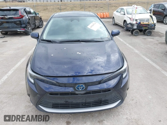 2023 Toyota Corolla Hybrid LE with VIN JTDBCMFE7PJ001872, listed as a IAAI auction lot 41529174 with 13,838 mi miles. Bid and sale history available at carsss.com. Image 12.