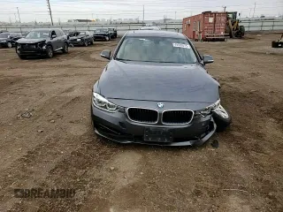 2018 BMW 3 Series 320i xDrive z VIN WBA8A3C57JA491717, wystawiony jako Copart lot #49509515 z przebiegiem 57 141 mil mil oraz Szkoda całkowita • Salvage title. Historia ofert i sprzedaży dostępna na DreamBid. Obrazek 11.