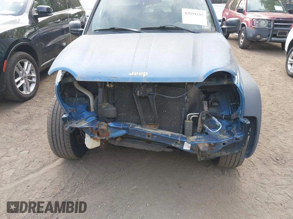2003 Jeep Liberty Sport with VIN 1J4GL48K23W685486, listed as a IAAI auction lot 42094185 with 156,690 mi miles. Bid and sale history available at carsss.com. Image 6.