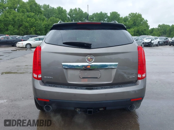 2012 Cadillac SRX Premium Collection z VIN 3GYFNCE3XCS620507, wystawiony jako IAAI lot #42348835 z przebiegiem 184 737 mil mil oraz . Historia ofert i sprzedaży dostępna na DreamBid. Obrazek 16.