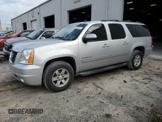2014 GMC Yukon XL SLT with VIN 1GKS1KE03ER234487, listed as a Copart auction lot 74897284 with 198,965 mi miles and Salvage Title. Bid and sale history available at carsss.com. Image 1.