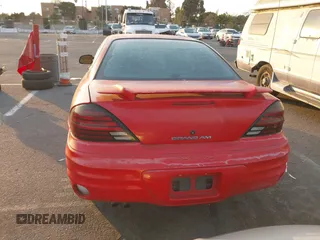 2001 Pontiac Grand Am SE1 with VIN 1G2NF52T91M570800, listed as a IAAI auction lot 41307660 with 180,401 mi miles. Bid and sale history available at carsss.com. Image 15.