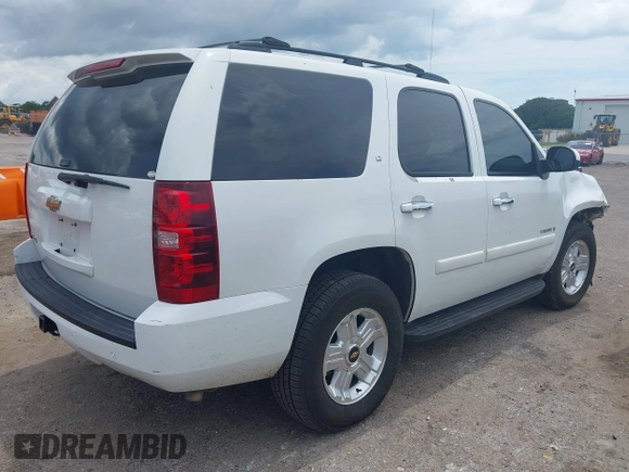 2007 Chevrolet Tahoe LTZ with VIN 1GNFC13J47J336516, listed as a IAAI auction lot 42545424 with 211,669 mi miles and . Bid and sale history available at DreamBid. Image 4.