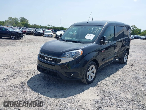 2022 Ram ProMaster City Cargo Tradesman z VIN ZFBHRFAB2N6Y42860, wystawiony jako IAAI lot #40139398 z przebiegiem 13 863 mil mil oraz . Historia ofert i sprzedaży dostępna na DreamBid. Obrazek 2.
