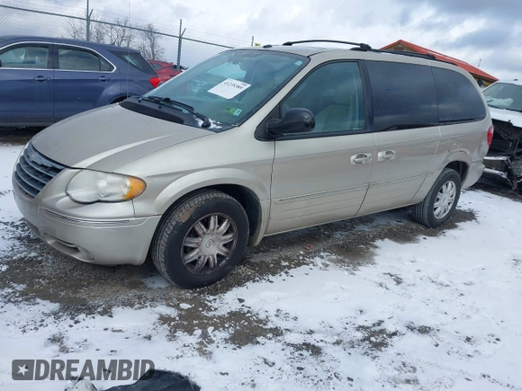 2006 Chrysler Town & Country LWB Touring with VIN 2A8GP54L86R887561, listed as a IAAI auction lot 41235389 with 124,554 mi miles. Bid and sale history available at carsss.com. Image 17.