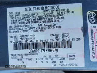 2012 Ford Fusion SEL with VIN 3FAHP0JA2CR209370, listed as a Copart auction lot 52406615 with 128,036 mi miles and Salvage Title. Bid and sale history available at carsss.com. Image 13.
