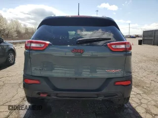 2014 Jeep Cherokee Trailhawk with VIN 1C4PJMBB4EW203320, listed as a Copart auction lot 53875305 with 112,425 mi miles and Clean Title. Bid and sale history available at carsss.com. Image 6.