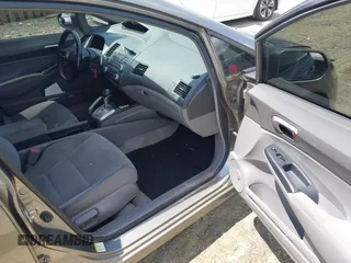 2006 Honda Civic LX with VIN 1HGFA16586L104230, listed as a IAAI auction lot 42215822 with 128,704 mi miles and . Bid and sale history available at DreamBid. Image 5.