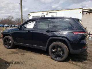 2023 Jeep Grand Cherokee Limited with VIN 1C4RJHBG2PC565808, listed as a Copart auction lot 52732085 with 11,828 mi miles and Salvage title. Bid and sale history available at DreamBid. Image 2.