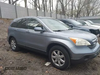 2009 Honda CR-V EX-L with VIN JHLRE48719C007622, listed as a IAAI auction lot 41999801 with 158,976 mi miles and . Bid and sale history available at carsss.com. Image 1.