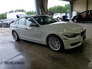 2013 BMW 3 Series 328i with VIN WBA3A5G52DNP18972, listed as a Copart auction lot 58122935 with 209,173 mi miles and Salvage title. Bid and sale history available at DreamBid. Image 4.