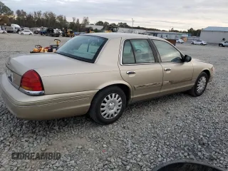 1999 Ford Crown Victoria z VIN 2FAFP73W4XX137040, wystawiony jako Copart lot #83741244 z przebiegiem 142 901 mil mil oraz Szkoda całkowita • Salvage title. Historia ofert i sprzedaży dostępna na DreamBid. Obrazek 3.