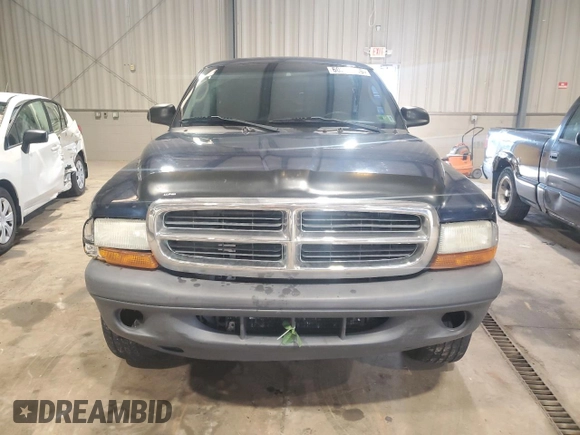 2004 Dodge Dakota z VIN 1D7GG16KX4S586053, wystawiony jako Copart lot #60221585 z przebiegiem 150 150 mil mil oraz Szkoda całkowita • Salvage title. Historia ofert i sprzedaży dostępna na DreamBid. Obrazek 5.