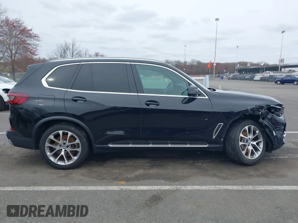 2023 BMW X5 xDrive40i with VIN 5UXCR6C0XP9P90557, listed as a IAAI auction lot 41860825 with 49,737 mi miles. Bid and sale history available at carsss.com. Image 13.