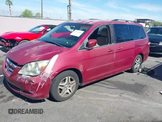 2005 Honda Odyssey EX z VIN 5FNRL38445B401163, wystawiony jako IAAI lot #42294253 z przebiegiem 152 576 mil mil oraz . Historia ofert i sprzedaży dostępna na DreamBid. Obrazek 2.