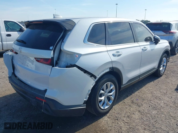 2024 Honda CR-V LX with VIN 5J6RS3H21RL007666, listed as a IAAI auction lot 40944721 with 6,823 mi miles and . Bid and sale history available at DreamBid. Image 4.