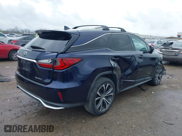 2018 Lexus RX 350L Premium with VIN JTJDZKCAXJ2009962, listed as a IAAI auction lot 41903717 with 100,308 mi miles and . Bid and sale history available at DreamBid. Image 4.