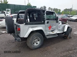 2003 Jeep Wrangler X with VIN 1J4FA39S13P363135, listed as a IAAI auction lot 42275729 with 178,138 mi miles and . Bid and sale history available at DreamBid. Image 4.