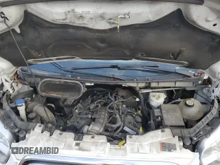 2015 Ford Transit Passenger XL with VIN 1FBZX2YG3FKA79794, listed as a Copart auction lot 77747364 with 77,693 mi miles and Salvage Title. Bid and sale history available at DreamBid. Image 12.