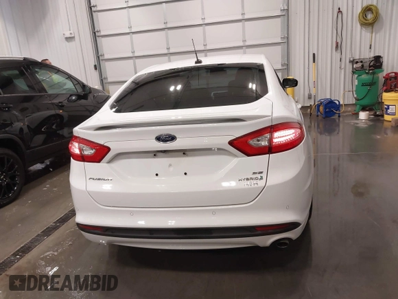 2015 Ford Fusion SE Hybrid with VIN 3FA6P0LU8FR215788, listed as a IAAI auction lot 42038194 with 136,949 mi miles and . Bid and sale history available at DreamBid. Image 16.