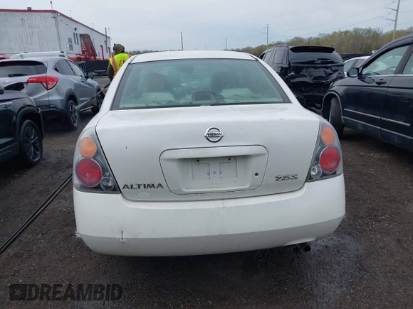 2002 Nissan Altima S with VIN 1N4AL11D72C138368, listed as a IAAI auction lot 41948552 with 242,060 mi miles. Bid and sale history available at carsss.com. Image 16.