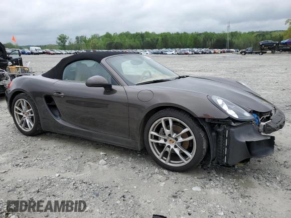 2015 Porsche Boxster with VIN WP0CA2A88FS120121, listed as a Copart auction lot 50591195 with 71,836 mi miles and Salvage title. Bid and sale history available at DreamBid. Image 4.