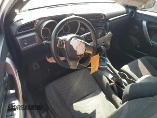 2014 Scion tC z VIN JTKJF5C79E3067932, wystawiony jako Copart lot #50425555 z przebiegiem Nie podano mil oraz Szkody całkowita. Historia ofert i sprzedaży dostępna na DreamBid. Obrazek 8.
