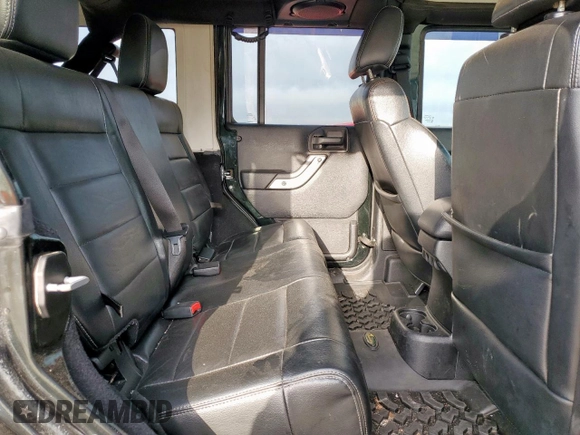 2012 Jeep Wrangler Unlimited Altitude with VIN 1C4HJWEGXCL180602, listed as a Copart auction lot 61391095 with 187,205 mi miles and Salvage title. Bid and sale history available at DreamBid. Image 11.