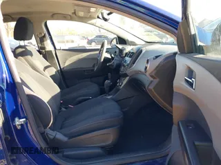 2014 Chevrolet Sonic LT with VIN 1G1JC5SH6E4164809, listed as a IAAI auction lot 42006407 with 105,710 mi miles and . Bid and sale history available at DreamBid. Image 5.