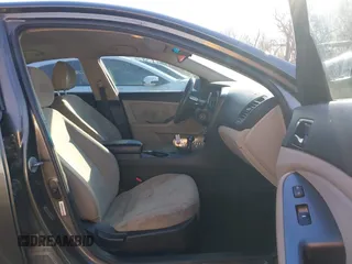 2015 Kia Optima LX with VIN 5XXGM4A71FG401974, listed as a IAAI auction lot 41781582 with 168,482 mi miles and . Bid and sale history available at DreamBid. Image 5.