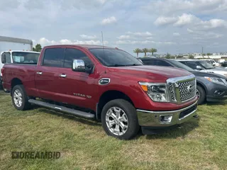 2016 Nissan Titan XD Platinum Reserve with VIN 1N6BA1F26GN512666, listed as a Copart auction lot 54364115 with 120,182 mi miles and Clean Title. Bid and sale history available at carsss.com. Image 1.