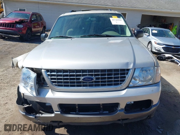 2004 Ford Explorer XLS z VIN 1FMZU72E14UC11599, wystawiony jako IAAI lot #41749597 z przebiegiem 82 805 mil mil oraz . Historia ofert i sprzedaży dostępna na DreamBid. Obrazek 12.