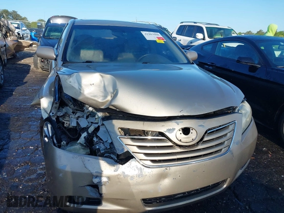 2007 Toyota Camry LE with VIN 4T1BK46K27U010739, listed as a IAAI auction lot 41983608 with 193,763 mi miles and . Bid and sale history available at DreamBid. Image 12.