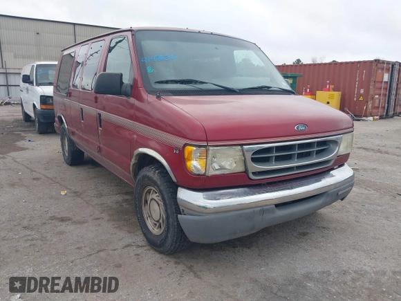 1999 Ford Econoline Cargo with VIN 1FDRE14W0XHB06565, listed as a IAAI auction lot 41496511 with 165,268 mi miles. Bid and sale history available at carsss.com. Image 1.