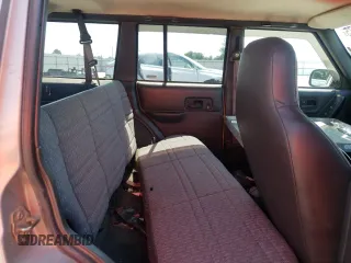 2000 Jeep Cherokee with VIN 1J4FN28S6YL210944, listed as a Copart auction lot 65163475 with 147,609 mi miles and Salvage title. Bid and sale history available at DreamBid. Image 11.