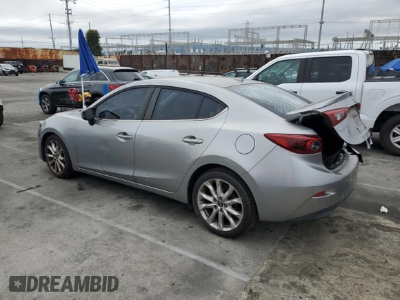 2014 Mazda 3 S Touring with VIN JM1BM1V31E1107453, listed as a Copart auction lot 48769215 with 145,346 mi miles and Salvage Title. Bid and sale history available at DreamBid. Image 2.