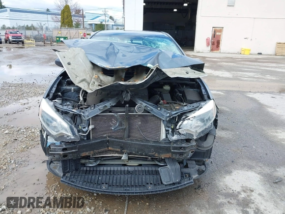 2015 Toyota Corolla L with VIN 2T1BURHE2FC398263, listed as a IAAI auction lot 41974719 with 157,631 mi miles and . Bid and sale history available at DreamBid. Image 12.