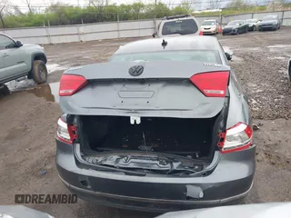 2014 Volkswagen Passat SE с VIN 1VWBN7A39EC085032, выставлен на аукционе IAAI как лот 41931302 с пробегом 193 425 миль миль и . История ставок и продаж доступна на DreamBid. Изображение 16.