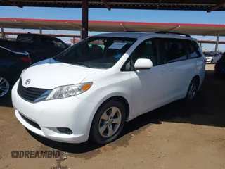 2012 Toyota Sienna LE AAS with VIN 5TDKK3DC4CS274117, listed as a IAAI auction lot 42008690 with 205,353 mi miles. Bid and sale history available at carsss.com. Image 2.