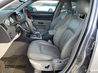 2006 Chrysler 300 C with VIN 2C3KK63H46H296625, listed as a Copart auction lot 70220974 with 104,811 mi miles and Salvage Title. Bid and sale history available at carsss.com. Image 7.