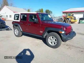 2021 Jeep Wrangler Unlimited Sport S z VIN 1C4HJXDG4MW647164, wystawiony jako IAAI lot #40952672 z przebiegiem 51 366 mil mil oraz . Historia ofert i sprzedaży dostępna na DreamBid. Obrazek 1.