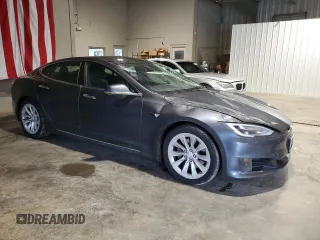 2017 Tesla Model S 100D with VIN 5YJSA1E29HF210731, listed as a Copart auction lot 56762565 with 114,117 mi miles and Salvage title. Bid and sale history available at DreamBid. Image 4.