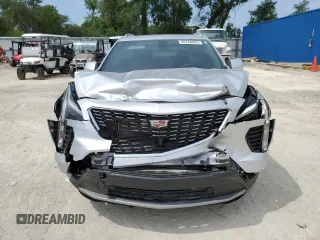 2019 Cadillac XT4 FWD Premium Luxury z VIN 1GYFZCR44KF195554, wystawiony jako Copart lot #55728095 z przebiegiem 35 948 mil mil oraz Nie do naprawy. Historia ofert i sprzedaży dostępna na DreamBid. Obrazek 5.