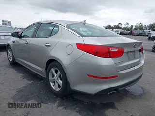 2015 Kia Optima LX with VIN KNAGM4A78F5584534, listed as a IAAI auction lot 42182927 with 63,225 mi miles and . Bid and sale history available at carsss.com. Image 3.