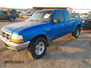 1999 Ford Ranger XL with VIN 1FTZR15V7XPB38465, listed as a IAAI auction lot 41097622 with 196,946 mi miles. Bid and sale history available at carsss.com. Image 2.