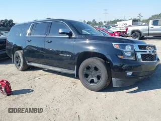 2018 Chevrolet Suburban LT with VIN 1GNSKHKCXJR268938, listed as a IAAI auction lot 41672886 with 76,844 mi miles and . Bid and sale history available at DreamBid. Image 1.