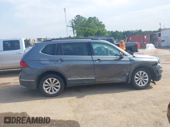 2018 Volkswagen Tiguan SEL z VIN 3VV3B7AX1JM045203, wystawiony jako IAAI lot #42572229 z przebiegiem 104 873 mil mil oraz . Historia ofert i sprzedaży dostępna na DreamBid. Obrazek 13.